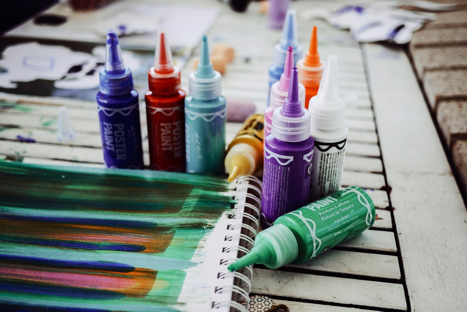 a group of crayons sitting on top of a table